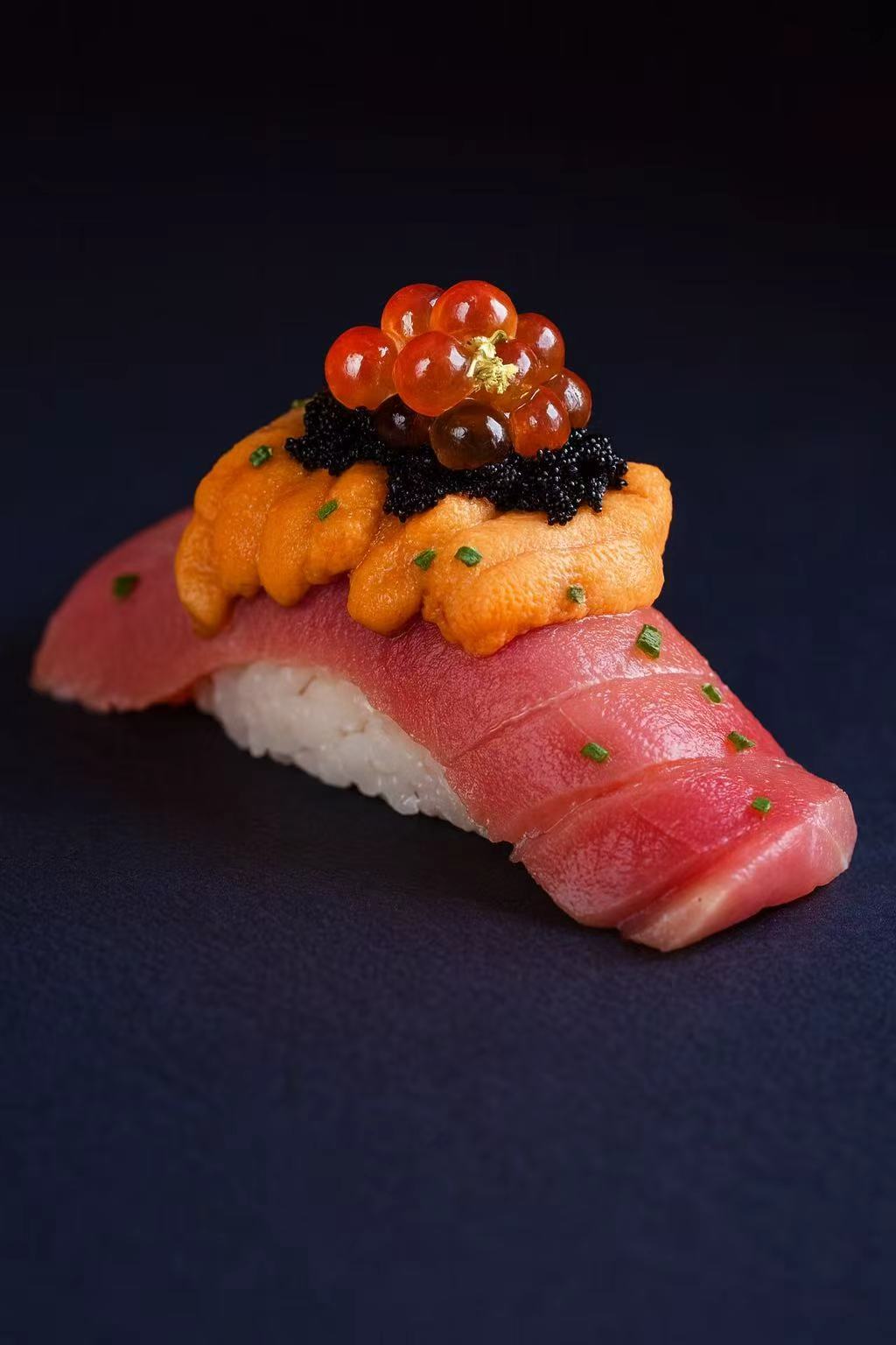 home_section2 A close-up photograph of a handcrafted sushi roll featuring premium bluefin tuna, artistically arranged on a serving platter as part of a professional Mr. Fresh sushi catering service display, highlighting the fresh ingredients and meticulous preparation typical of Mr. Fresh Catering events.